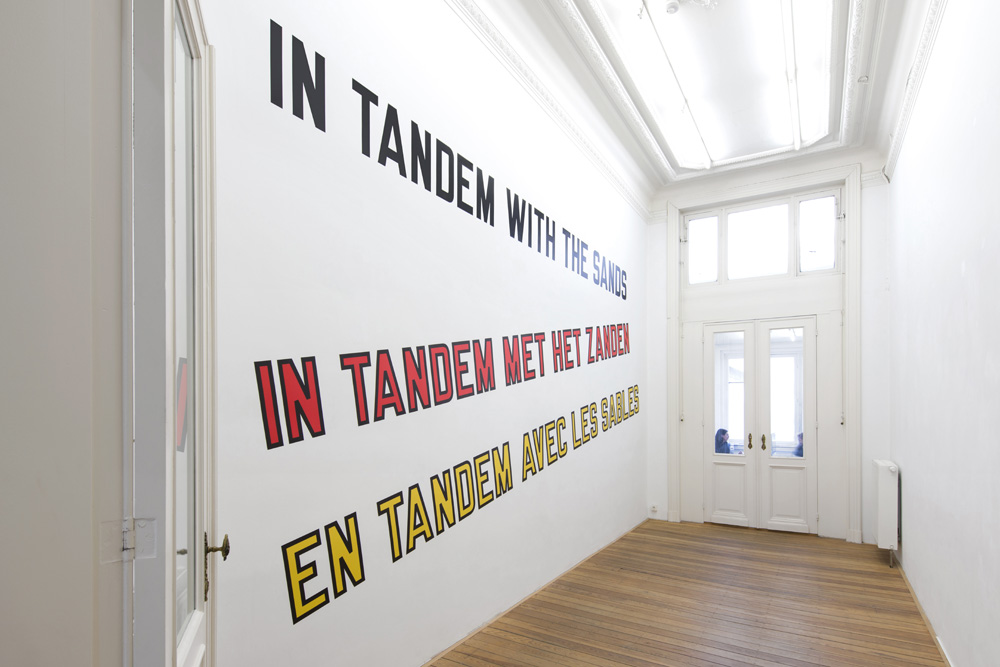Lawrence Weiner Dvir Gallery IN TANDEM WITH THE SANDS