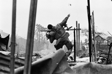 Don McCullin, US Marine hurling a grenade seconds before being shot through the left hand, Hue, Vietnam, 1968 , Howard Greenberg Gallery