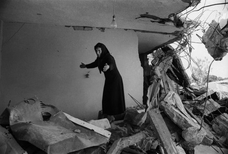 Don McCullin, A Palestinian woman returning to the ruins of her house, Sabra, Beirut, 1982 , Howard Greenberg Gallery