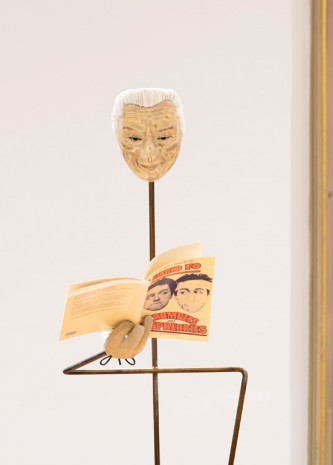 Simon Starling , The artist, wearing a mask of the former Fiat supremo Giovanni Agnelli, reads an aside from Dario Fo’s political satire Trumpets and Raspberries (1974) in which a disfigured Agnelli has his face reconstructed in the Image of a Fiat worker in whose ja, 2019, Galleria Franco Noero