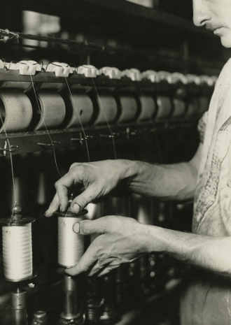 Lewis Hine, Rayon yarn being wound from one bobbin on to another and being twisted. Paterson, New Jersey, March 18, 1937, , Howard Greenberg Gallery