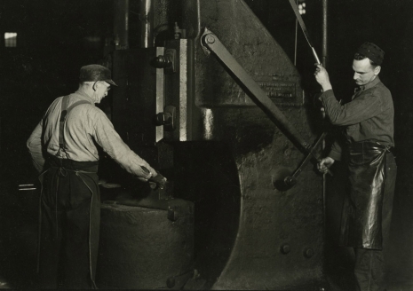 Lewis Hine, Modern Blacksmith and Assistant Hammering out a tool. Baldwin Locomotive Works, Eddystone, Pennsylvania, March 1937 , , Howard Greenberg Gallery