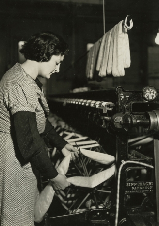 Lewis Hine, After drying, the skeins are taken from the rack and each skein is put on a swift of the winding machine. Paterson, New Jersey, March 18, 1937 , , Howard Greenberg Gallery