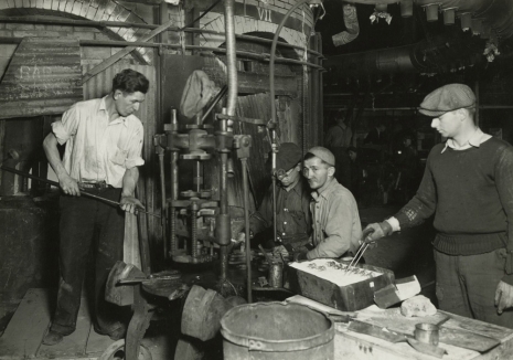 Lewis Hine, Pressing and shaping glass bottles. T.C. Wheaton Co. Millville, New Jersey, March 23, 1937 , , Howard Greenberg Gallery