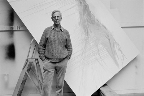 Bruce Bernard, Michael Andrews in his Norfolk studio; behind the artist, ’A View from Uamh Mhòr’ in an early state, 1990 (posthumously printed 2016), Gagosian