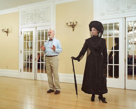 Jeff Wall, Ivan Sayers, costume historian, lectures at the University Women's Club, Vancouver, 7 December 2009. Virginia Newton-Moss wears a British ensemble c. 1910, from Sayers' collection, 2009, Marian Goodman Gallery
